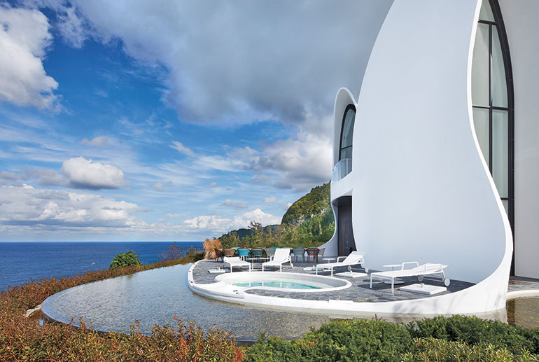 The System Lab Brings Billowing Concrete Forms to a Volcanic Island